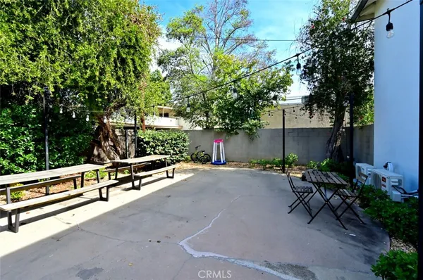 a view of a house with wooden stairs