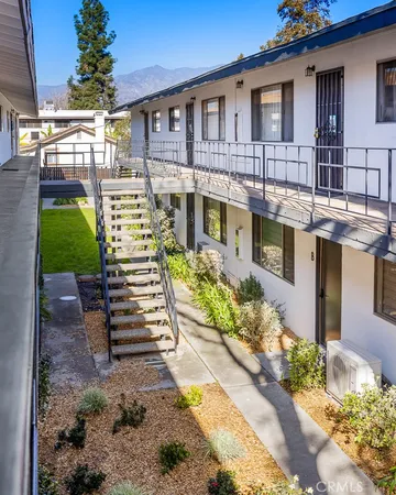 a view of a livingroom with wooden floor