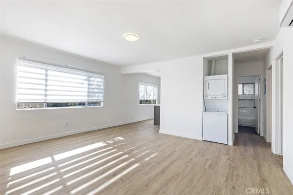 a kitchen with a stove and a sink