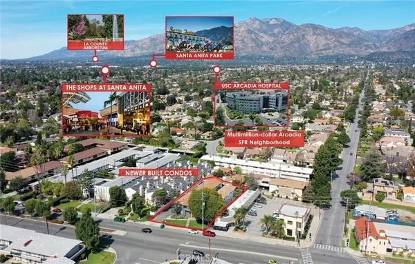 front view of house with a yard and potted plants