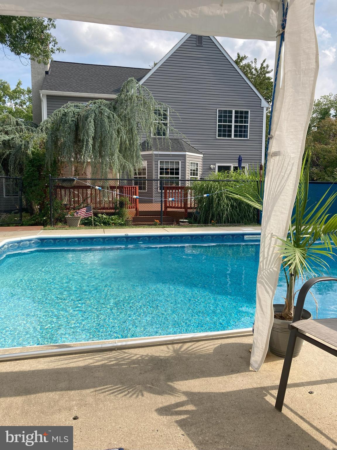 430 Ellis Road Langhorne, PA 19047 - Photo 4 of 36 Pool Patio Toward House & Deck