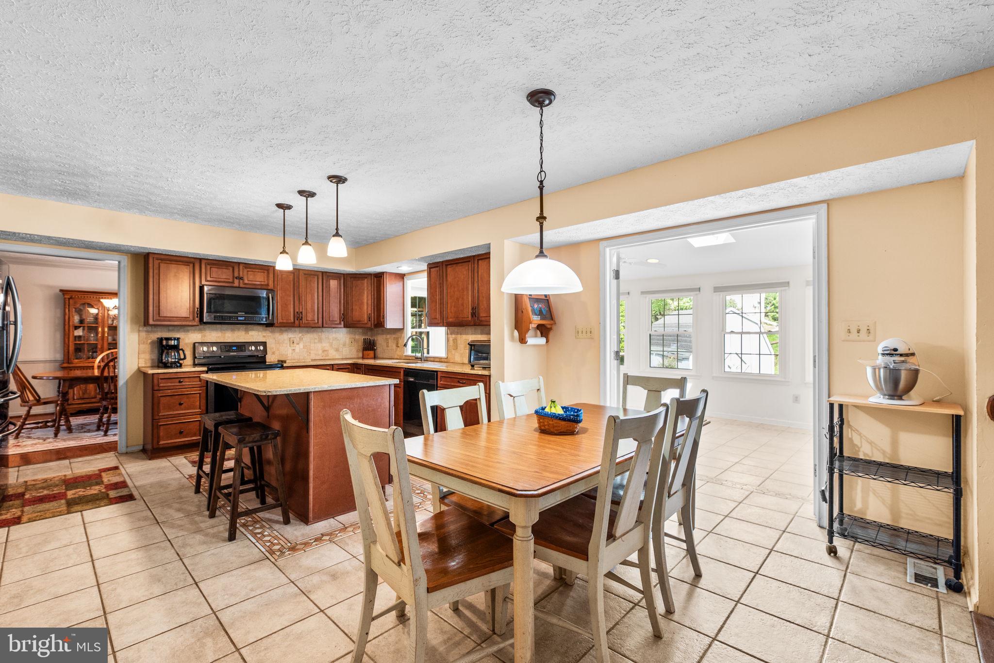 9464 Joppa Pond Road Baltimore, MD 21234 - Photo 20 of 66 a view of a dining area with furniture