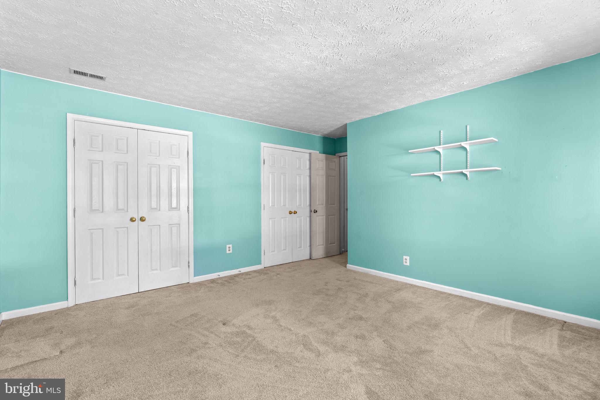 9464 Joppa Pond Road Baltimore, MD 21234 - Photo 46 of 66 a view of an empty room with a fireplace