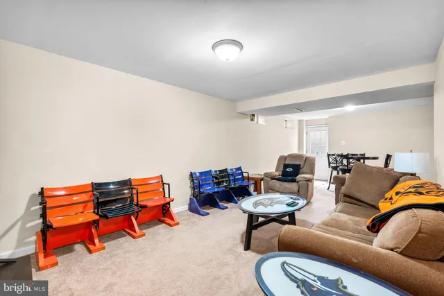 a view of a house with a backyard porch and sitting area