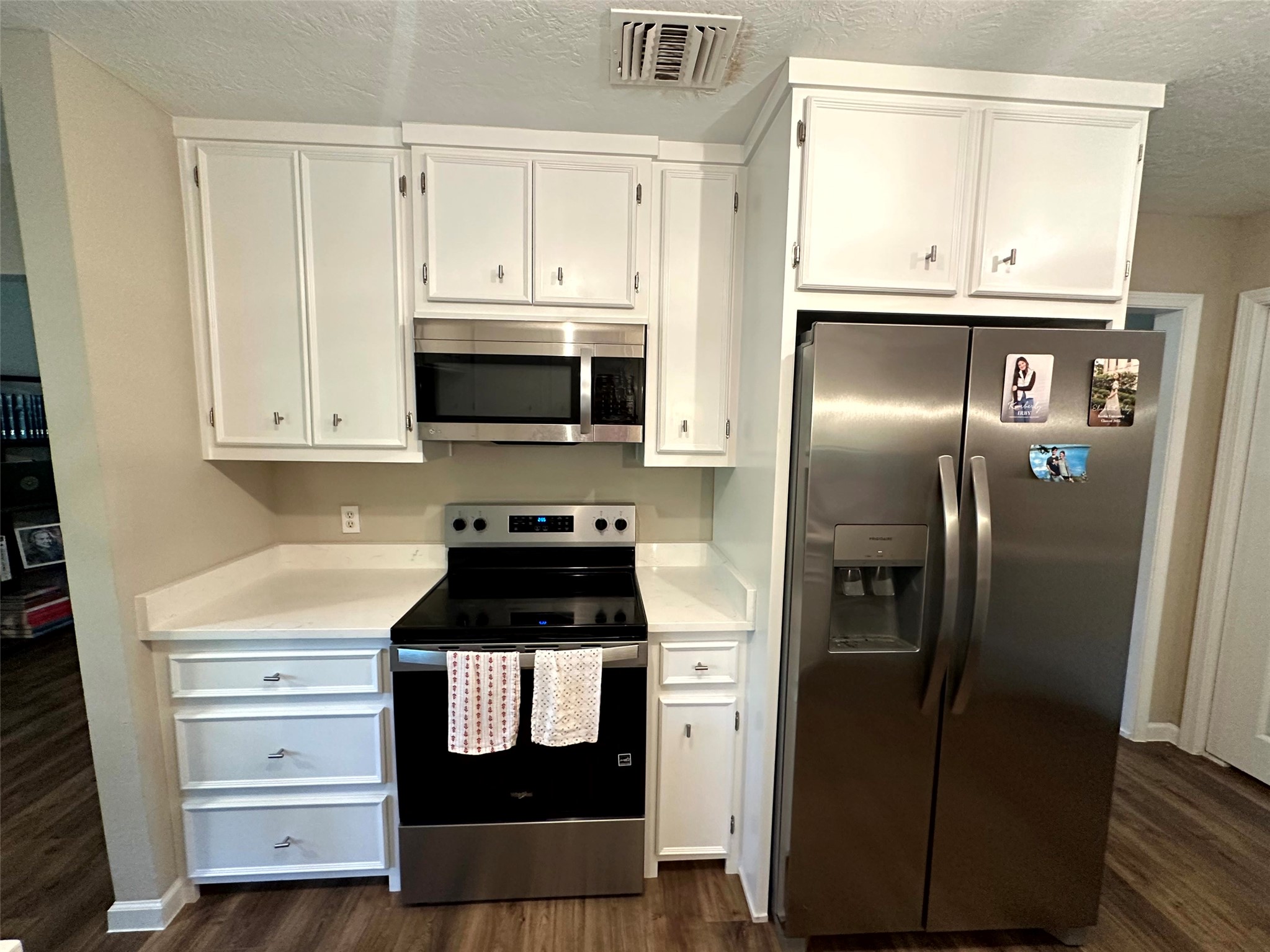 12289 Thompson Road Willis, TX 77318 - Photo 8 of 20 Ample cabinet storage - refrigerator included in the lease.