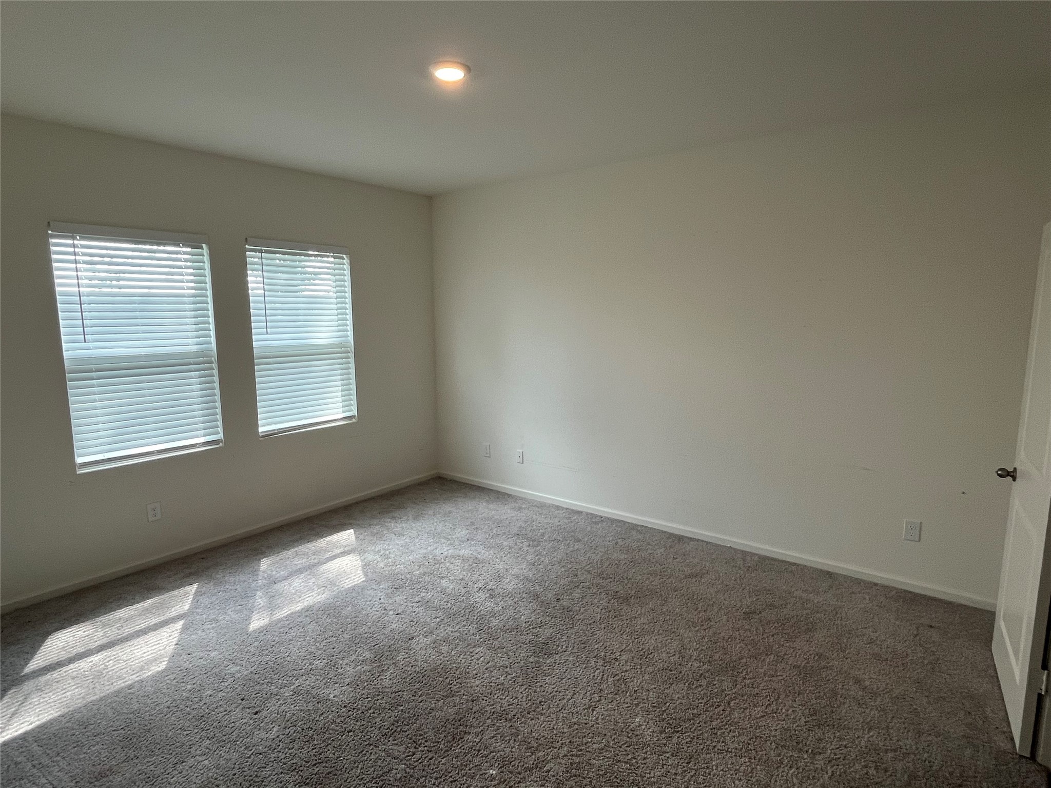 14715 Peaceful Way New Caney, TX 77357 - Photo 12 of 17 an empty room with a window