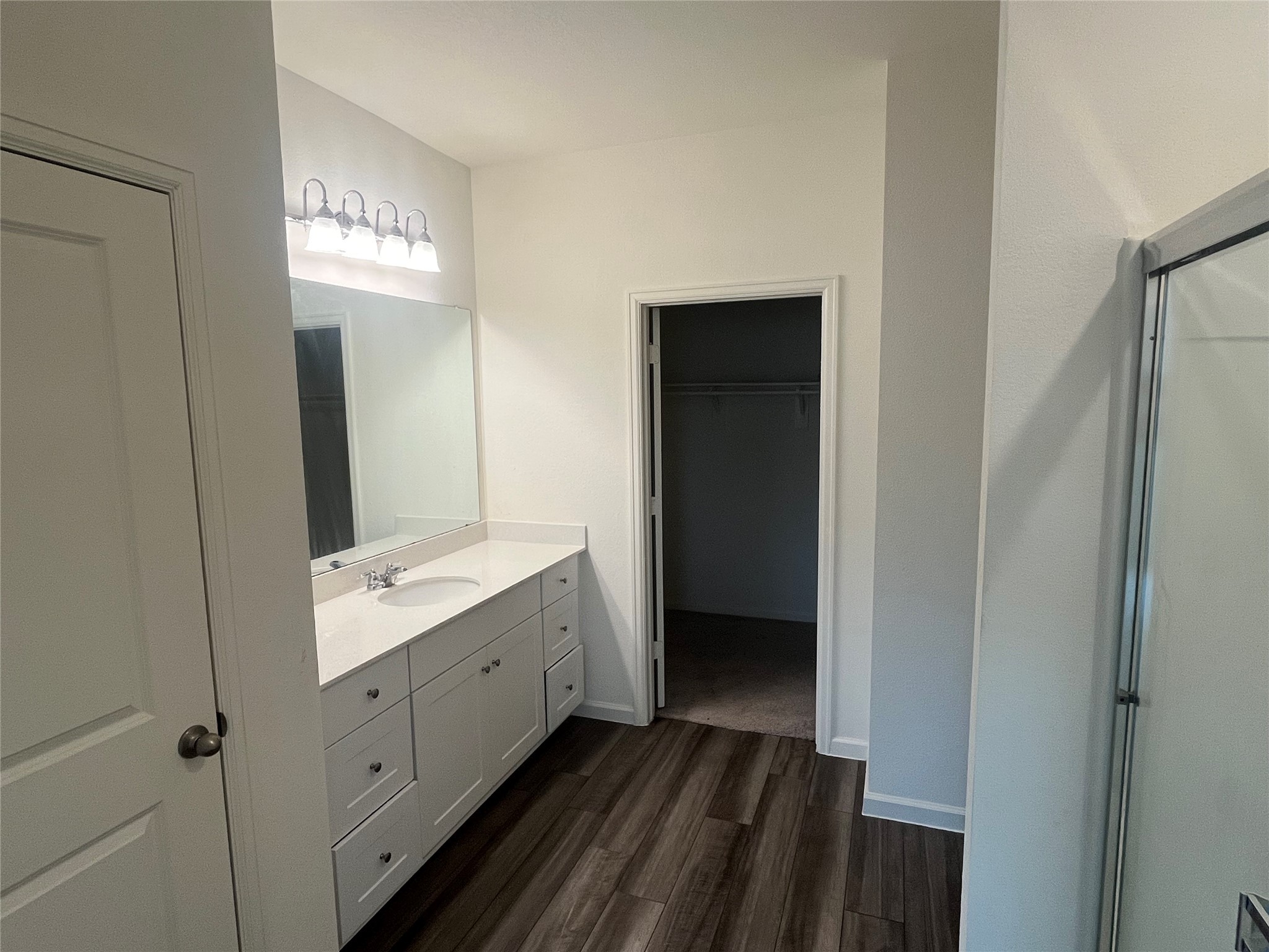 14715 Peaceful Way New Caney, TX 77357 - Photo 15 of 17 a bathroom with a sink a mirror and a toilet