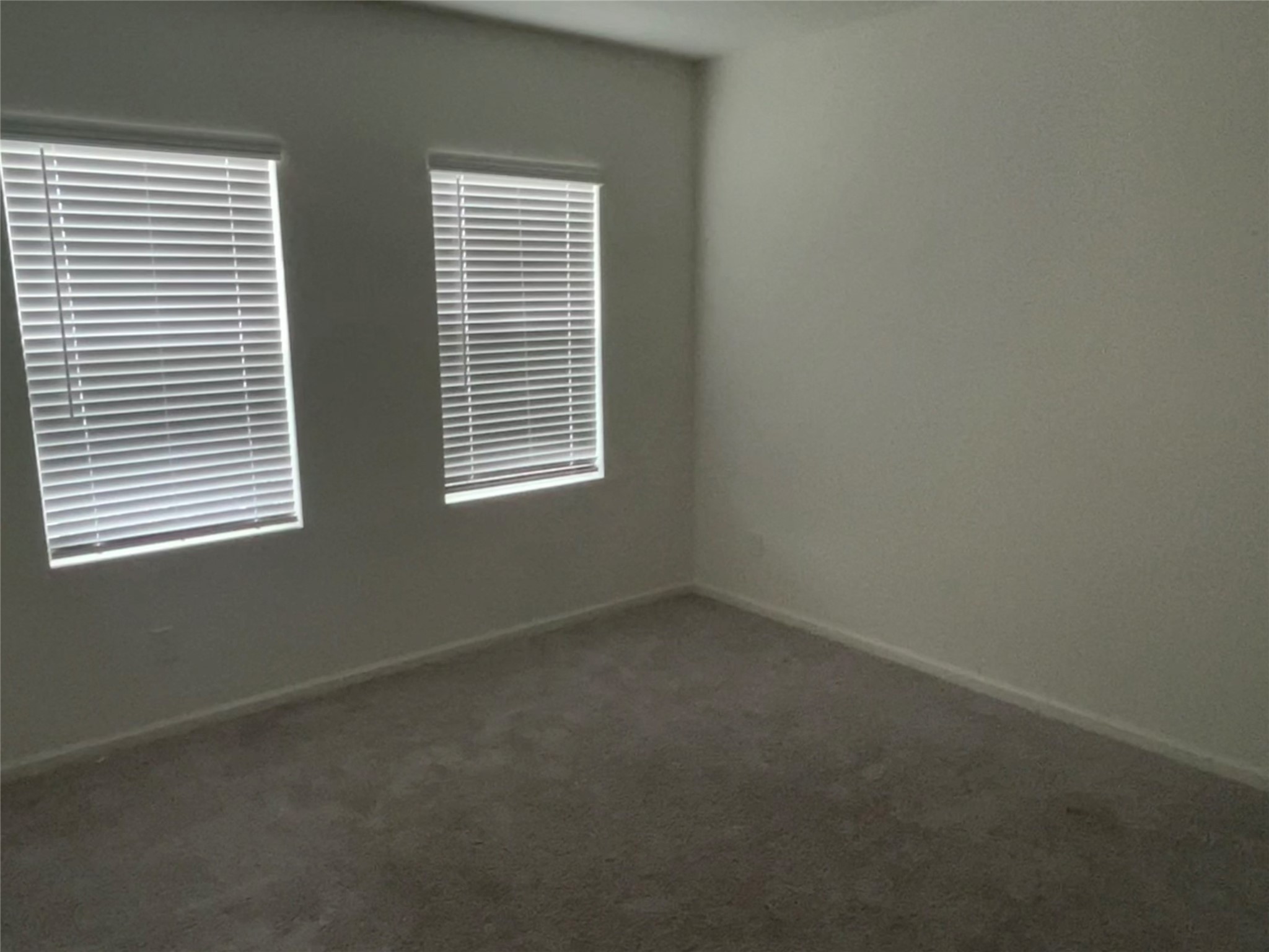 14715 Peaceful Way New Caney, TX 77357 - Photo 3 of 17 an empty room with a window
