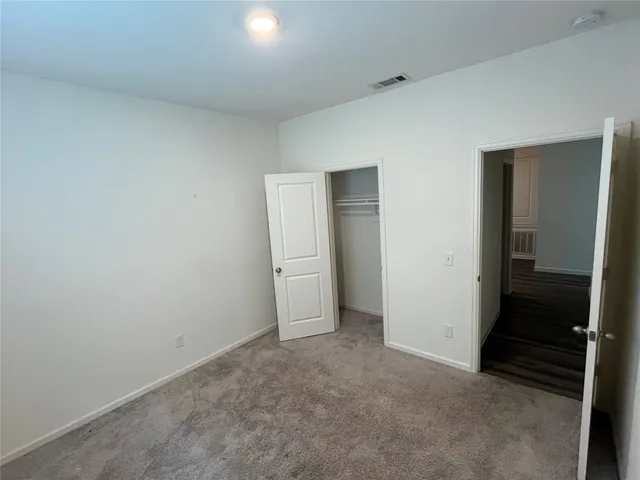 an empty room with closet