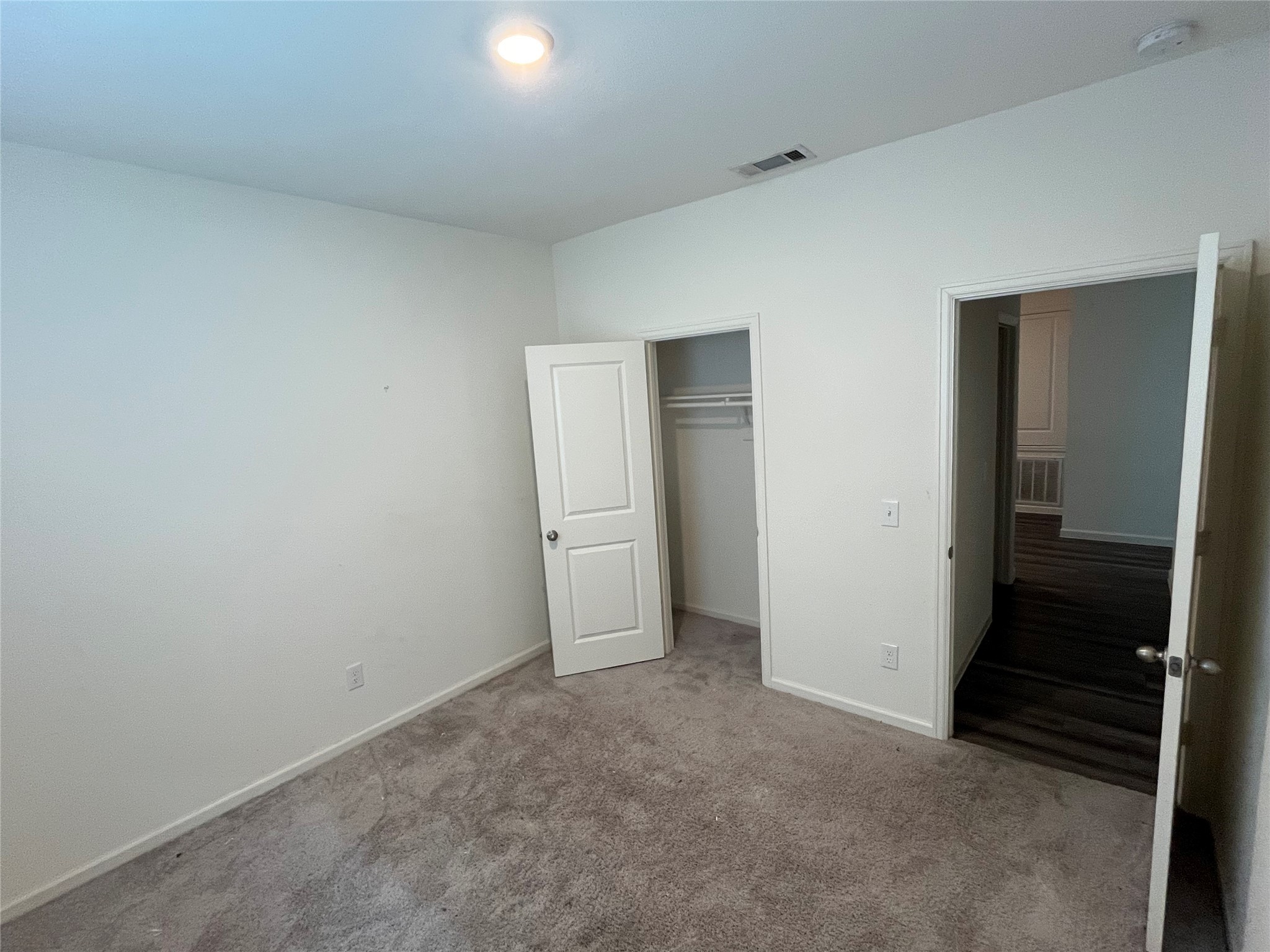 14715 Peaceful Way New Caney, TX 77357 - Photo 8 of 17 an empty room with closet