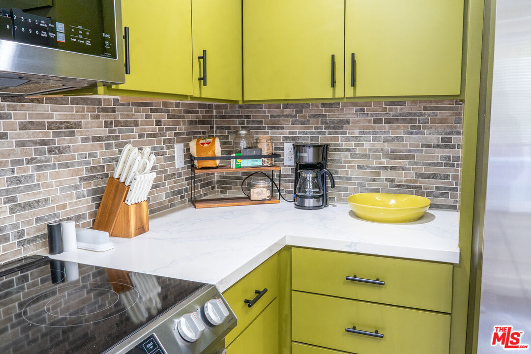 348 Laveta Terrace, Unit 2 Los Angeles, CA 90026 - Photo 2 of 20 a bathroom with a sink a bathtub and a vanity