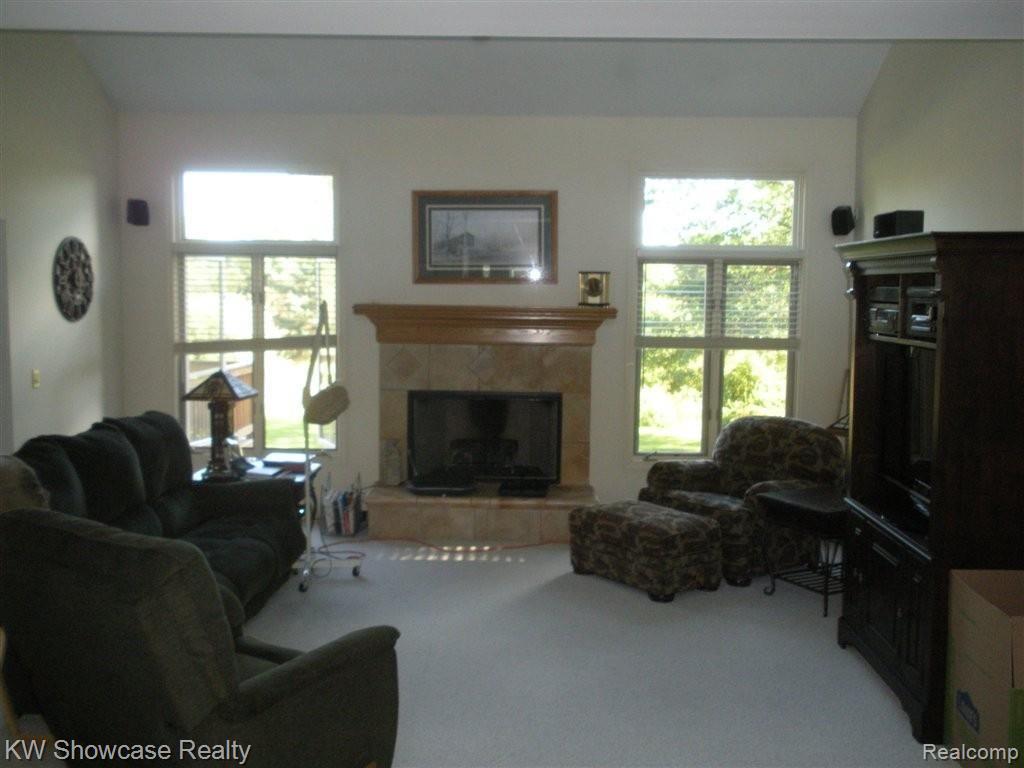 12226 Cundy Road Hartland, MI 48353 - Photo 9 of 18 GREAT RM W/FIREPLACE