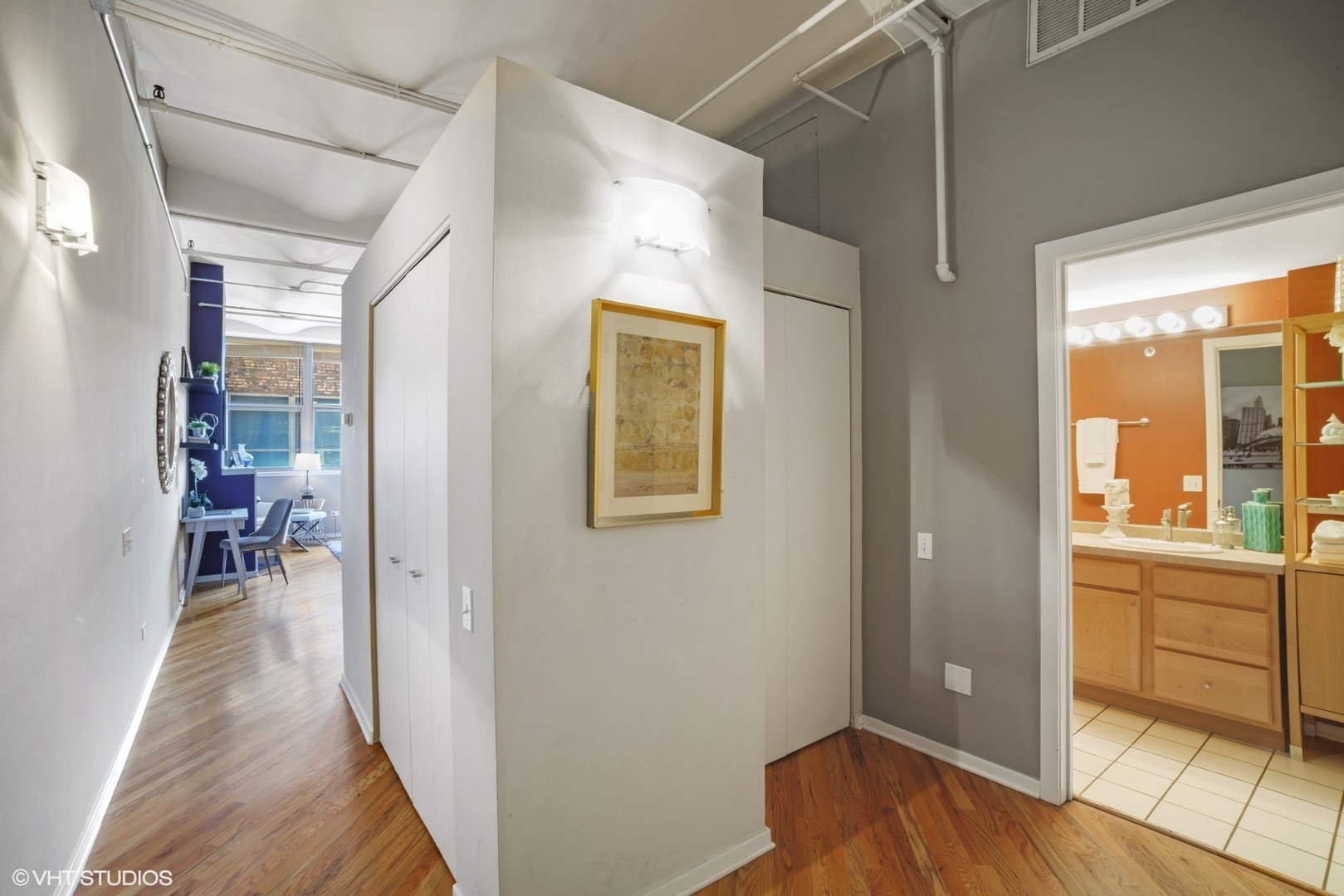 500 South Clinton Street, Unit 217 Chicago, IL 60607 - Photo 2 of 11 a view of a hallway with wooden floor and windows