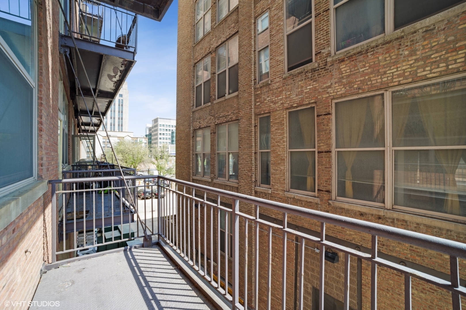 500 South Clinton Street, Unit 217 Chicago, IL 60607 - Photo 8 of 11 a view of a building from a balcony