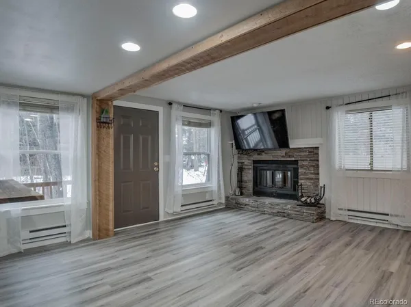 a living room with a fireplace in it