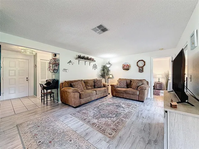 a living room with furniture and a couch