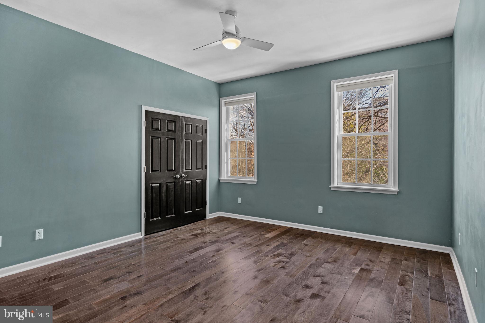 828 South 5th Street Philadelphia, PA 19147 - Photo 13 of 27 a view of an empty room with wooden floor and a window