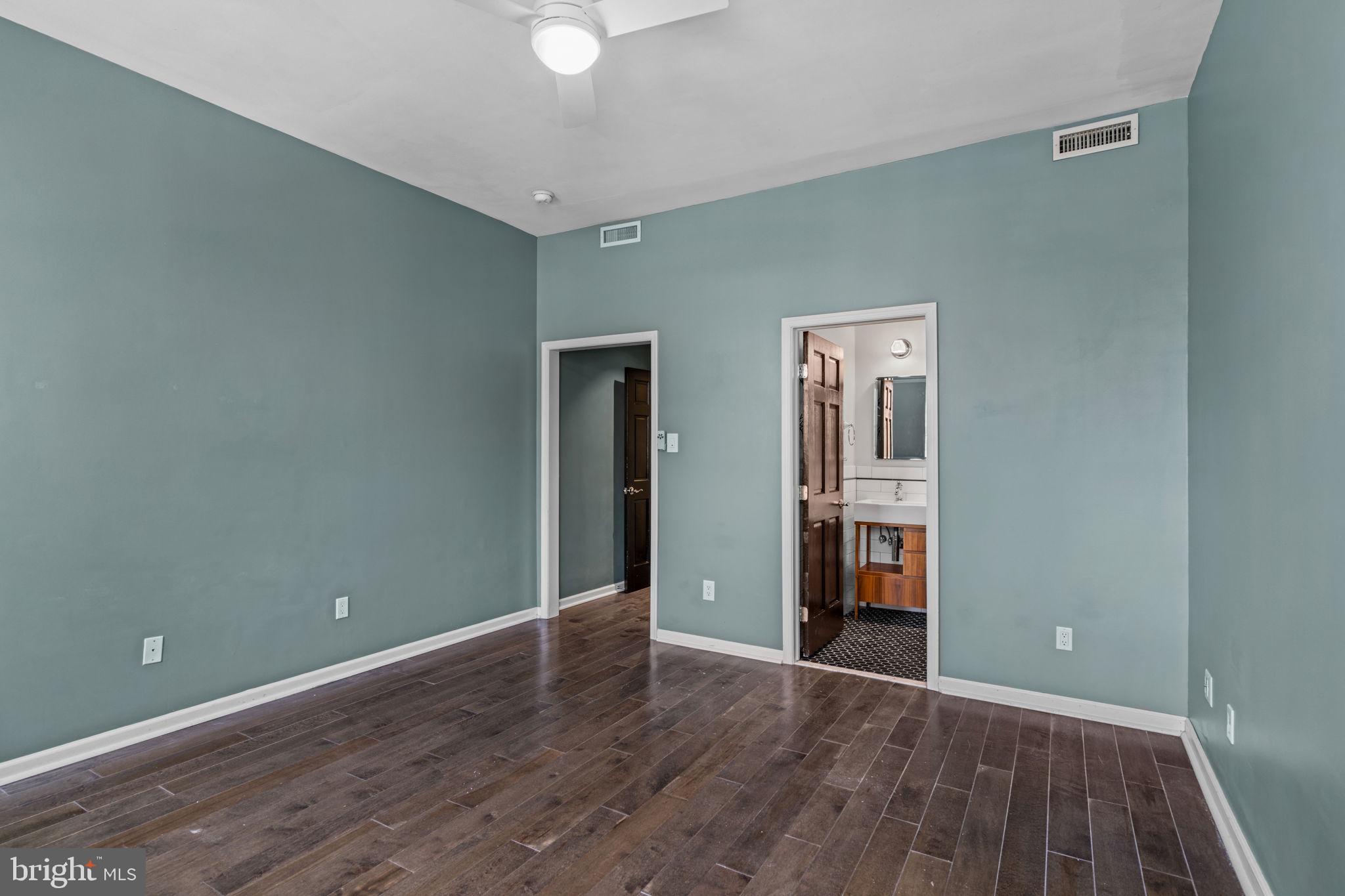 828 South 5th Street Philadelphia, PA 19147 - Photo 15 of 27 a view of an empty room with wooden floor