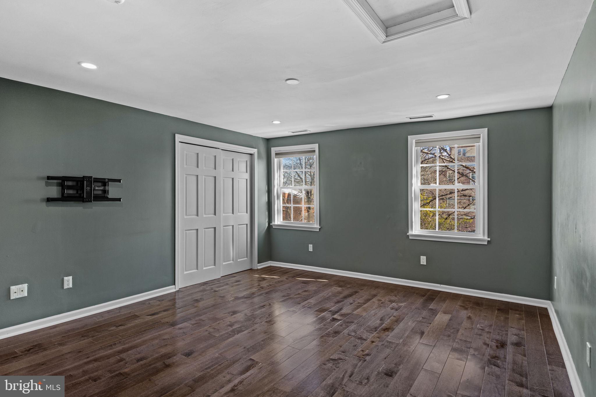 828 South 5th Street Philadelphia, PA 19147 - Photo 23 of 27 a view of an empty room with wooden floor and a window