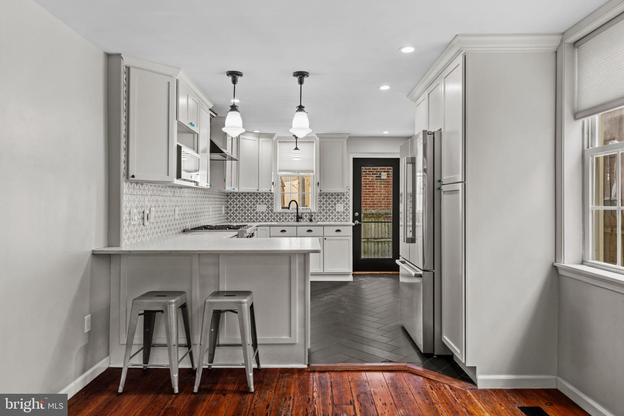 828 South 5th Street Philadelphia, PA 19147 - Photo 8 of 27 a view of kitchen with sink and refrigerator
