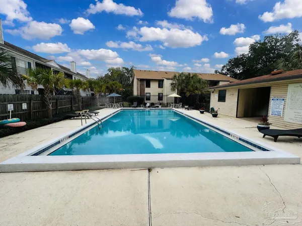 a view of a porch with furniture