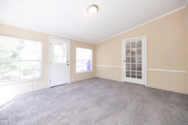 an empty room with windows