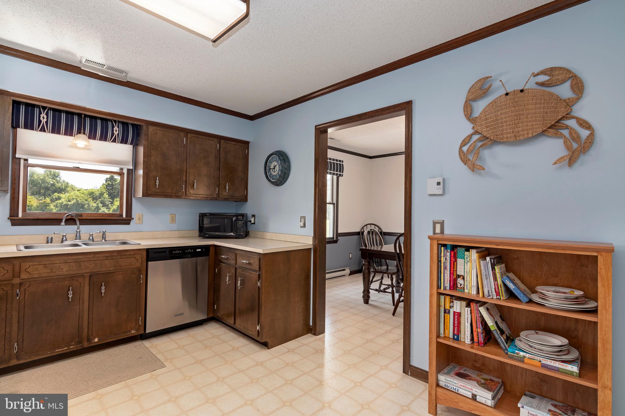 22561 Indian Point Road Bozman, MD 21612 - Photo 7 of 71 Access to dining room from kitchen