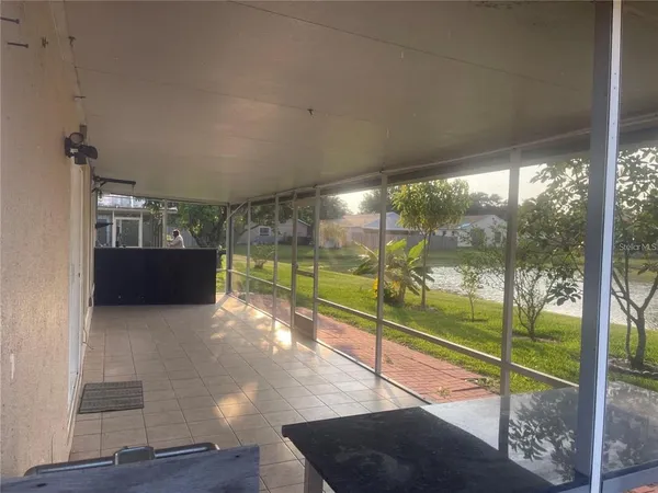 a view of a lake from a living room