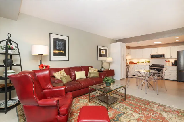 a living room with furniture and a table
