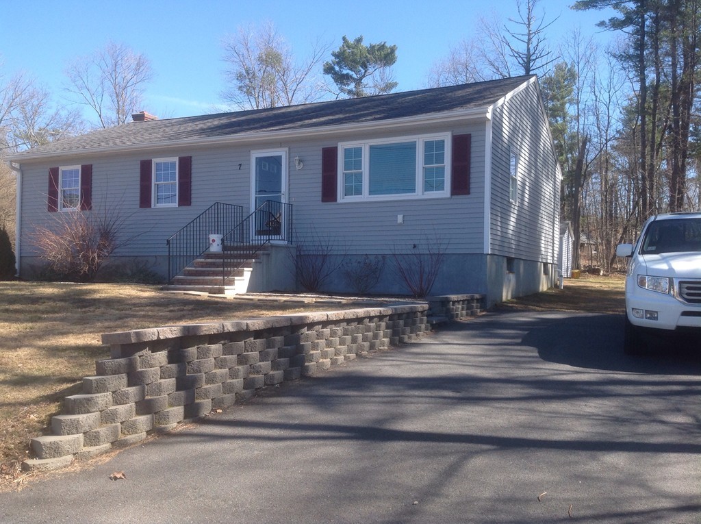 7 Farquhar Road Sturbridge, MA 01566 - Photo 1 of 18 a view of a house with a yard