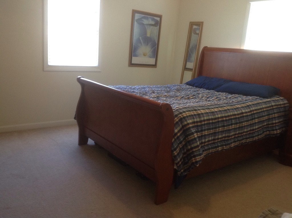 7 Farquhar Road Sturbridge, MA 01566 - Photo 11 of 18 a bed sitting in a bedroom next to a window