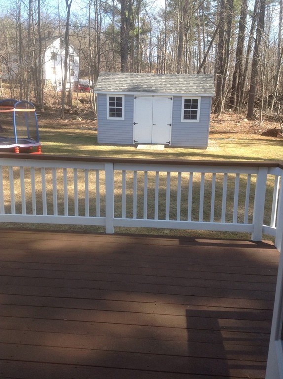 7 Farquhar Road Sturbridge, MA 01566 - Photo 18 of 18 a view of building with trees in the background