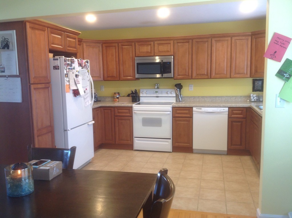 7 Farquhar Road Sturbridge, MA 01566 - Photo 6 of 18 a kitchen with stainless steel appliances granite countertop a refrigerator stove top oven and sink