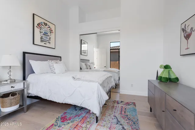 an aerial view of a house with a swimming pool