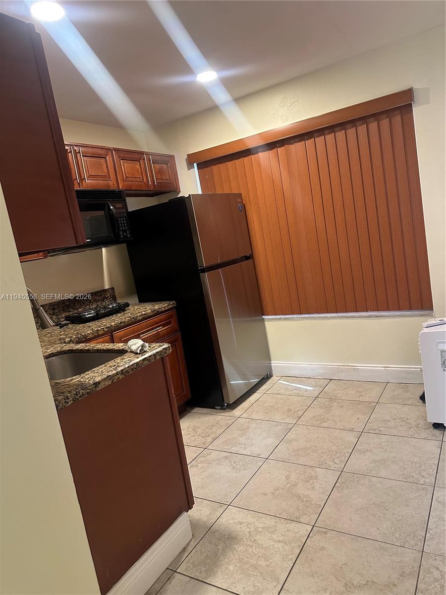 1360 Northeast 144th Street, Unit 3 Miami, FL 33161 - Photo 3 of 12 a view of utility room