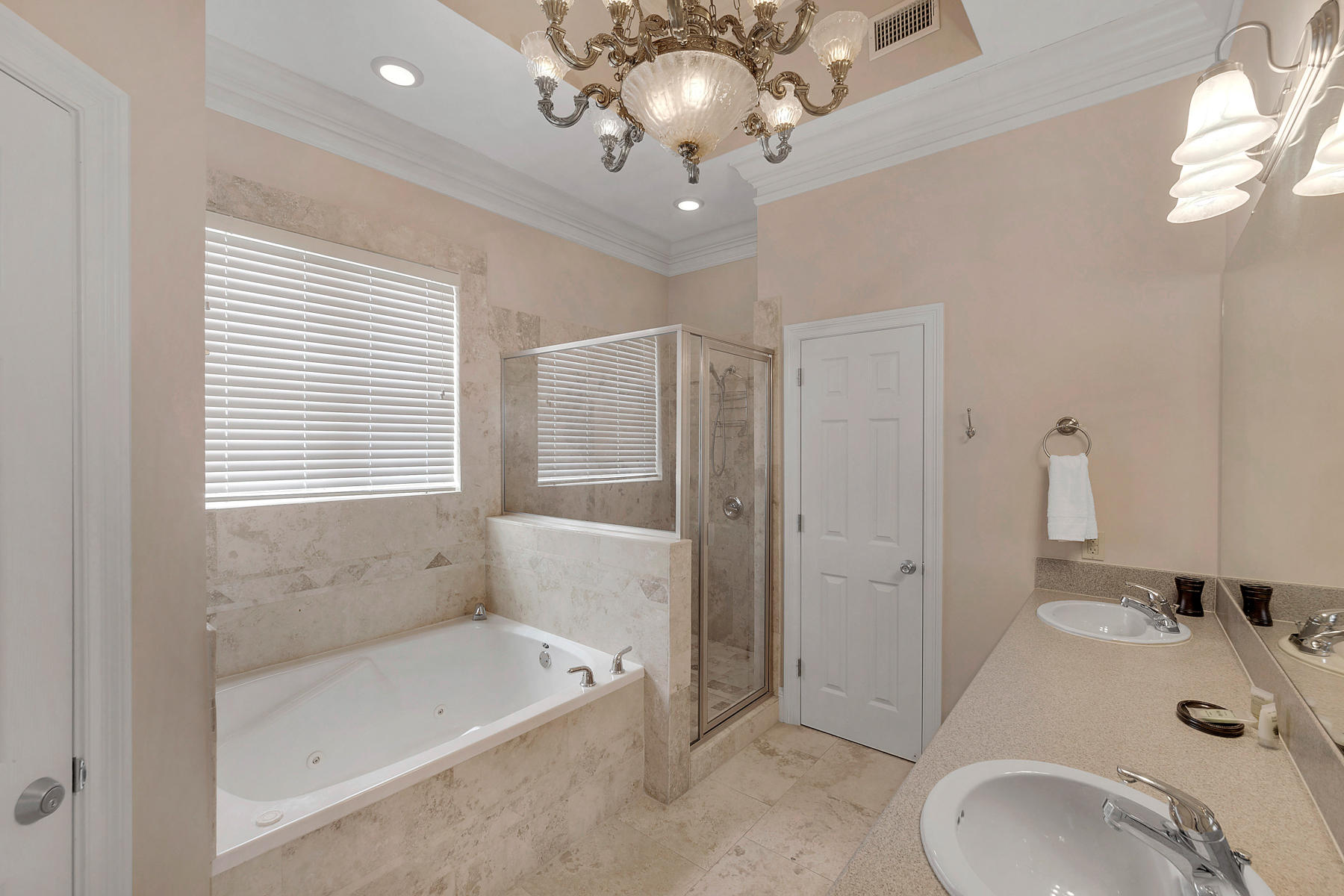 42 Fort Panic Road Santa Rosa Beach, FL 32459 - Photo 17 of 60 a bathroom with a tub sink and mirror