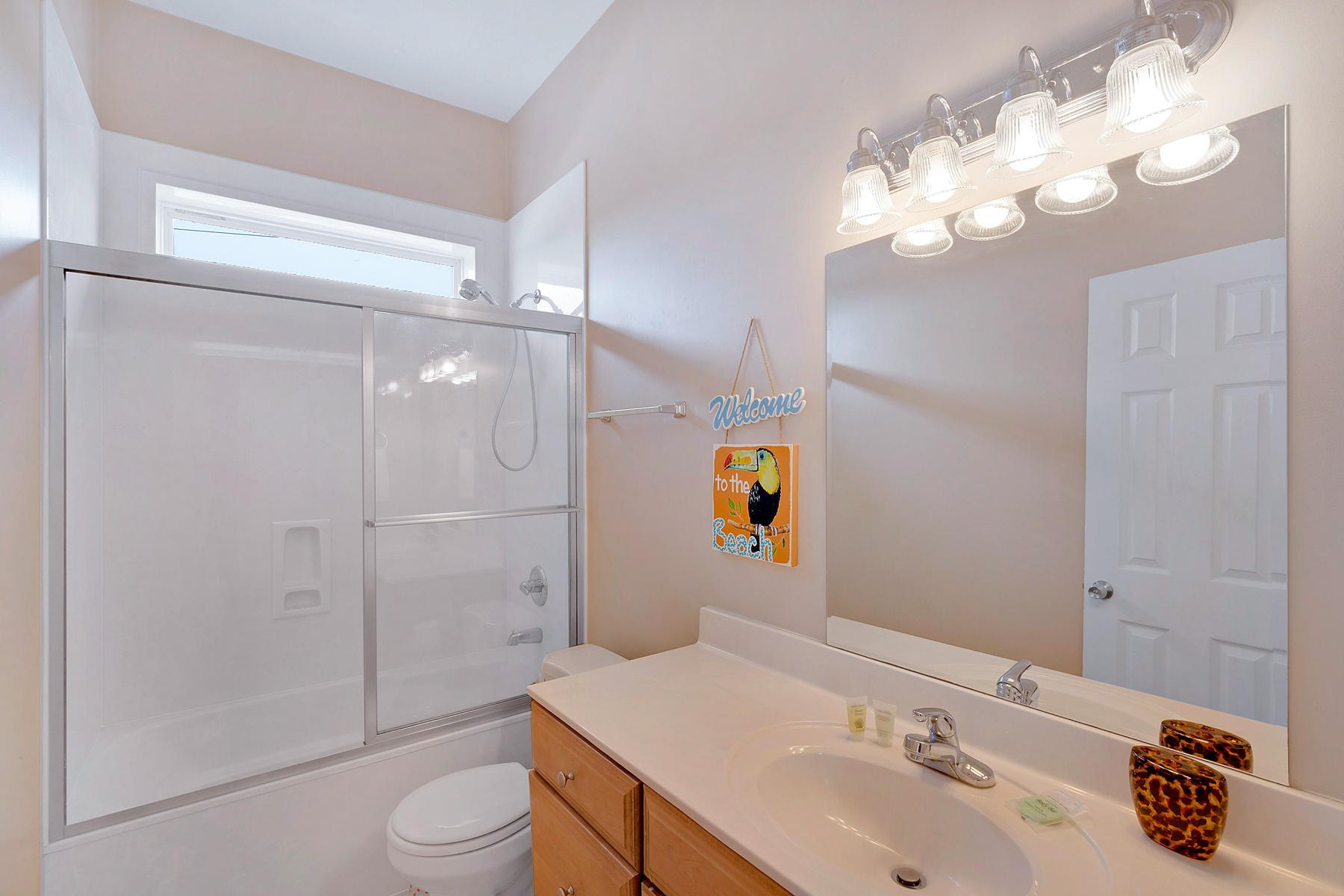 42 Fort Panic Road Santa Rosa Beach, FL 32459 - Photo 23 of 60 a bathroom with a sink a toilet and shower