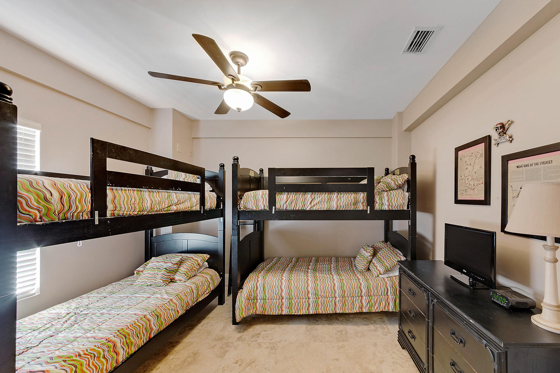42 Fort Panic Road Santa Rosa Beach, FL 32459 - Photo 29 of 60 a bedroom with furniture and a ceiling fan