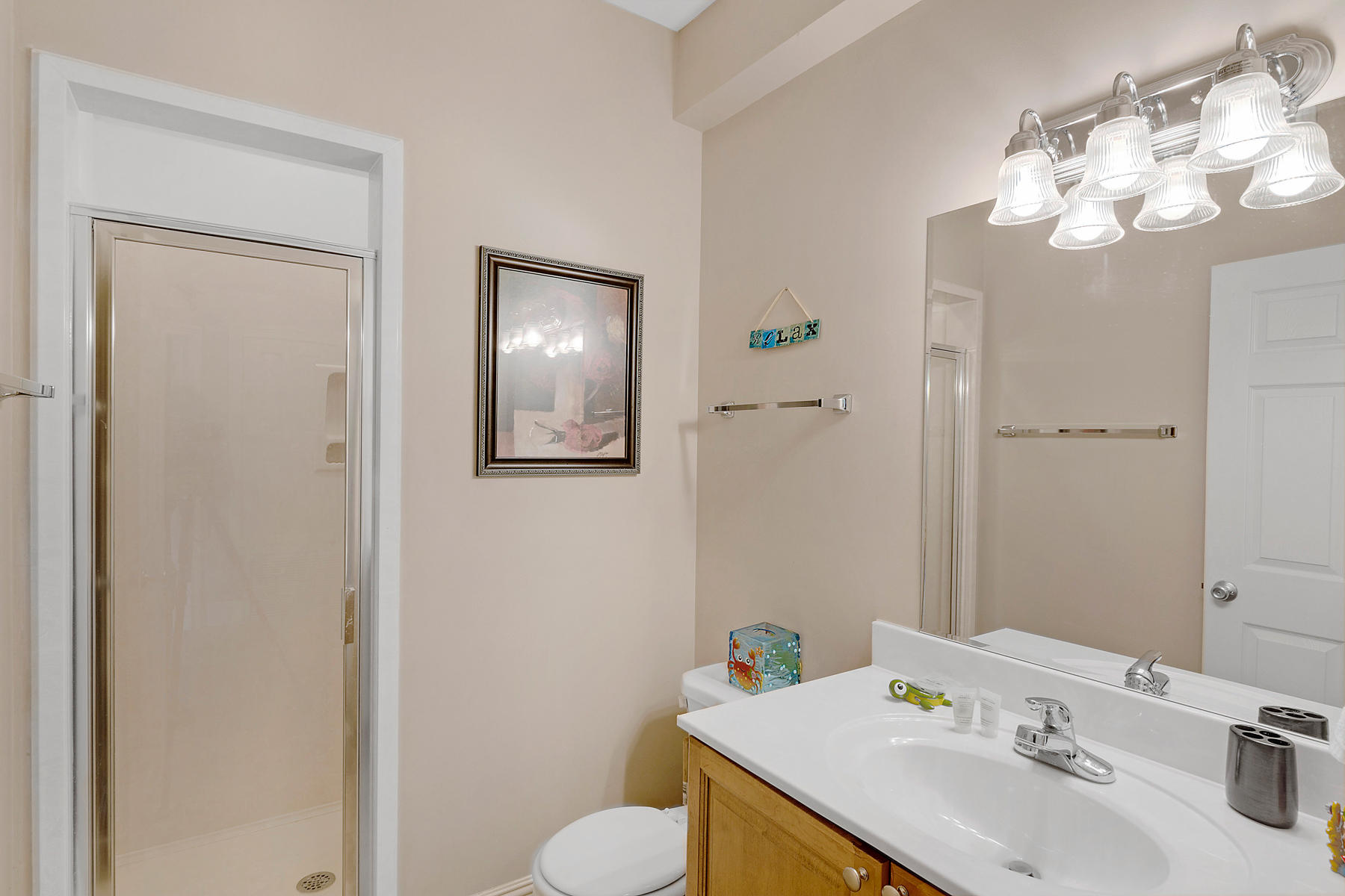 42 Fort Panic Road Santa Rosa Beach, FL 32459 - Photo 31 of 60 a bathroom with a sink vanity and a mirror