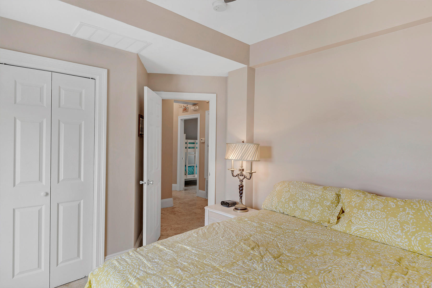 42 Fort Panic Road Santa Rosa Beach, FL 32459 - Photo 33 of 60 a bedroom with a bed and a mirror