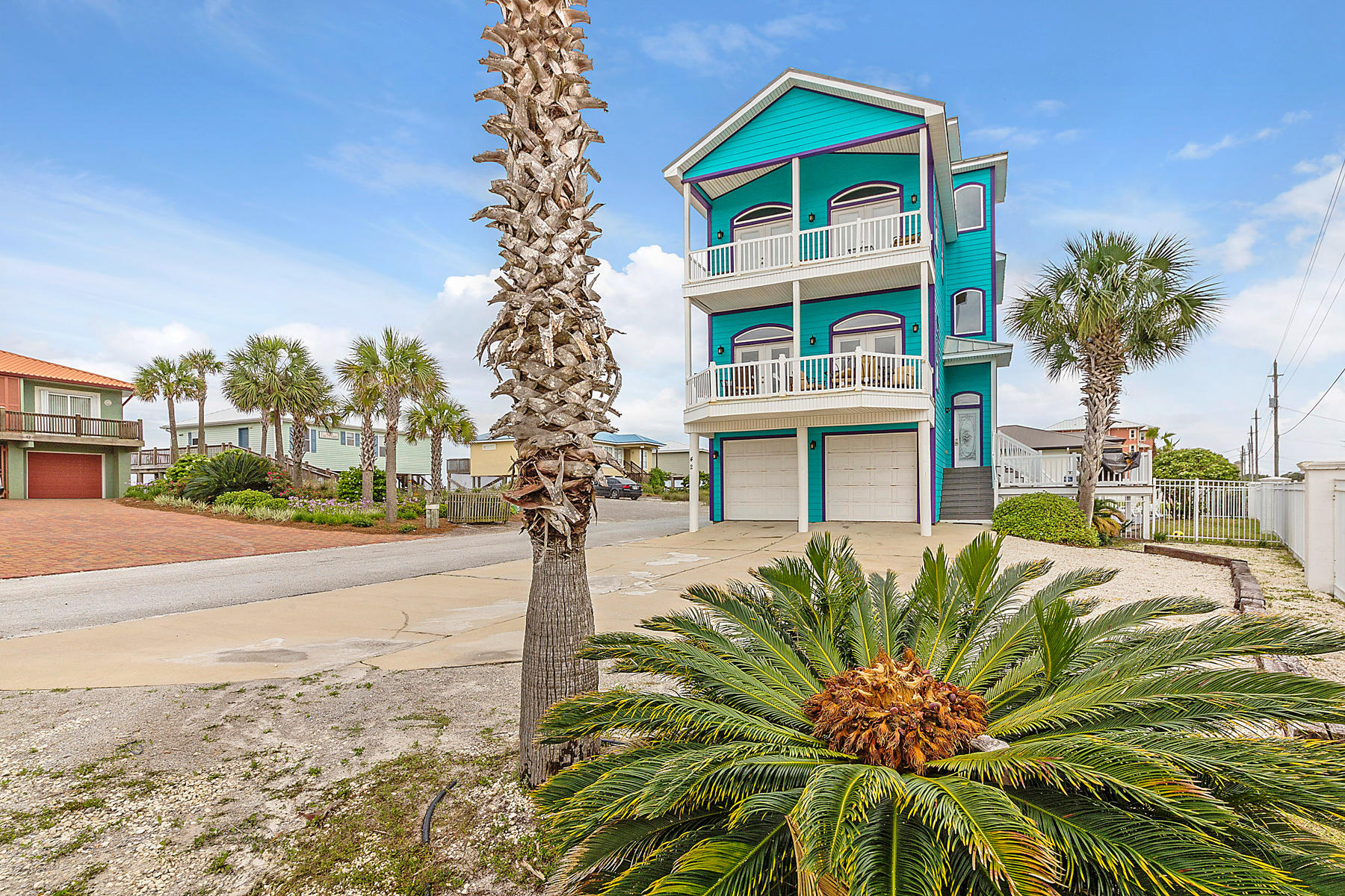 42 Fort Panic Road Santa Rosa Beach, FL 32459 - Photo 38 of 60 a front view of multi story residential apartment building with yard