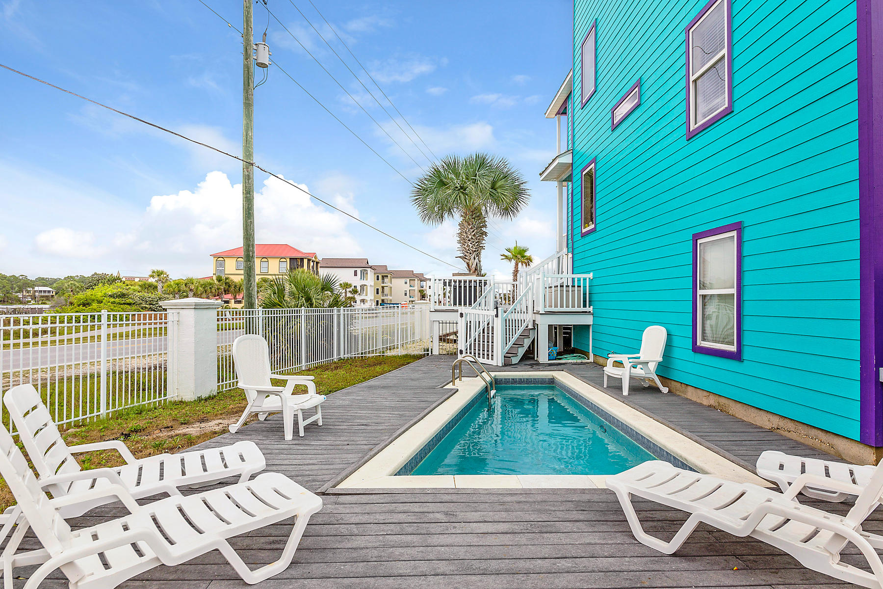 42 Fort Panic Road Santa Rosa Beach, FL 32459 - Photo 46 of 60 a view of a patio with a table chairs and a patio
