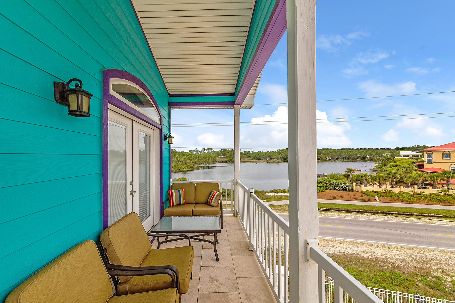 42 Fort Panic Road Santa Rosa Beach, FL 32459 - Photo 53 of 60 a balcony with furniture and a view of a balcony