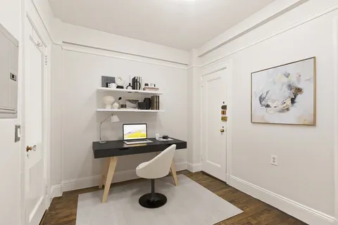 a room with furniture and window