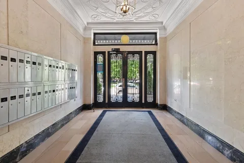 a view of a large room with windows