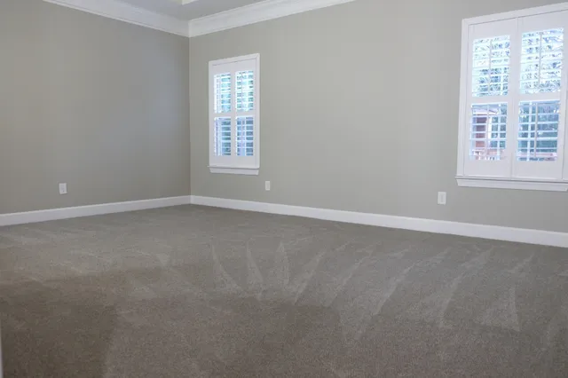 an empty room with windows