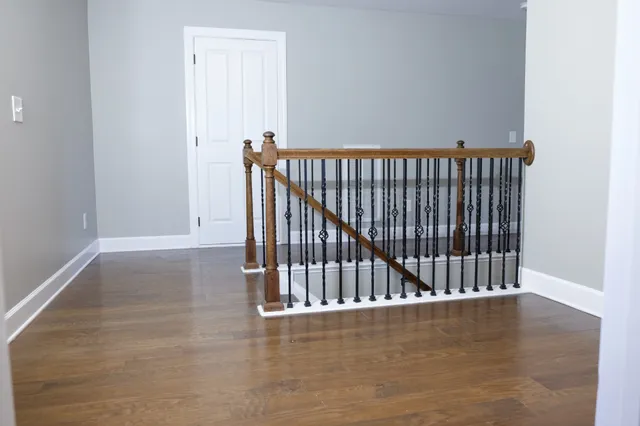 a view of entryway with wooden floor