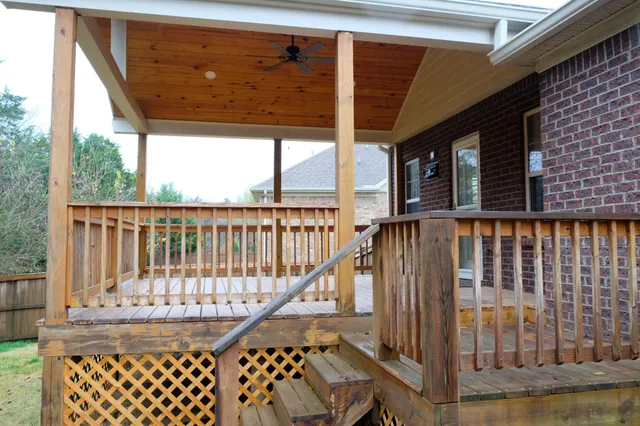 a front view of a house with wooden stairs