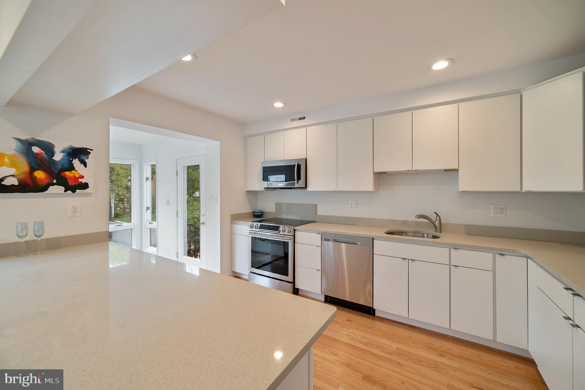 4929 Jamestown Road Bethesda, MD 20816 - Photo 17 of 39 Remodeled kitchen with granite countertops