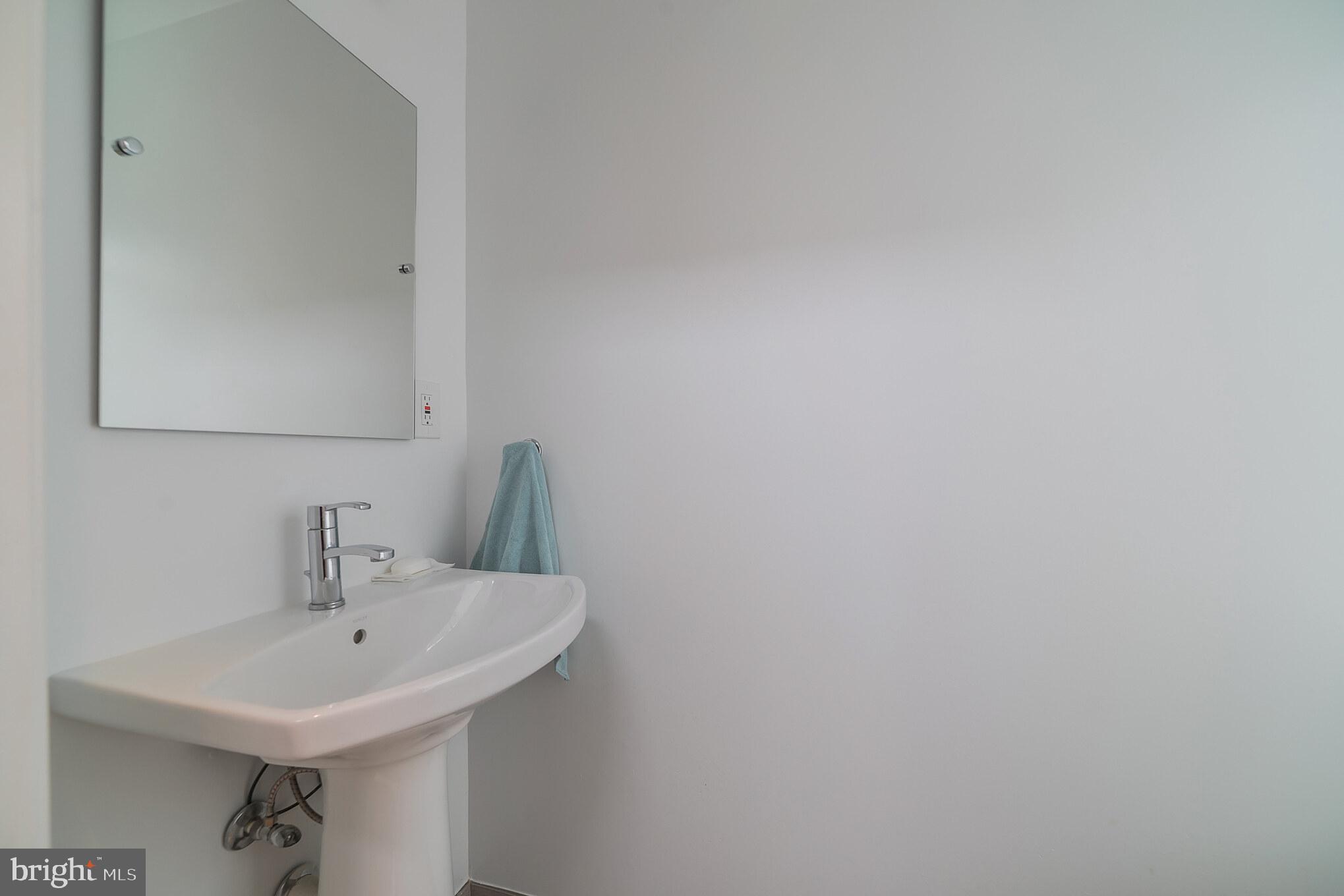 4929 Jamestown Road Bethesda, MD 20816 - Photo 34 of 39 Lower level powder room (3rd bathroom)